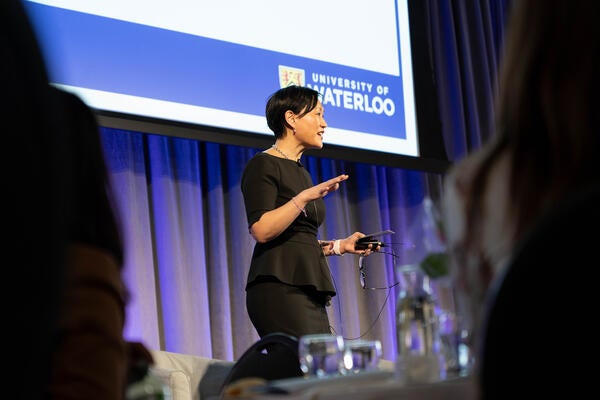 Jennifer Lee speaking at an International Women's Day event